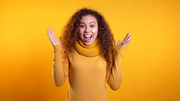 Portrait of Young Thinking Pondering Woman Having Idea Moment Pointing Finger Up