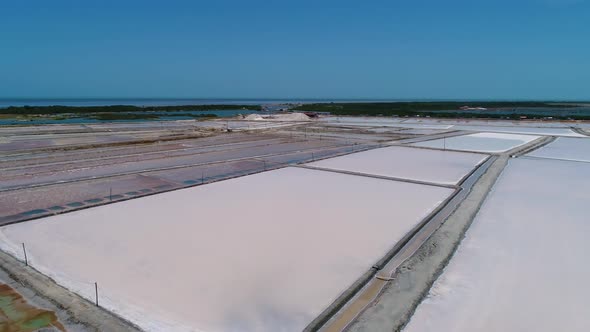 Aerial view of white salines industry near the ocean, Brazil.