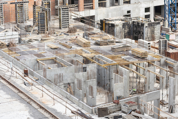 Construction of apartment buildings, dense urban development. The process of construction of