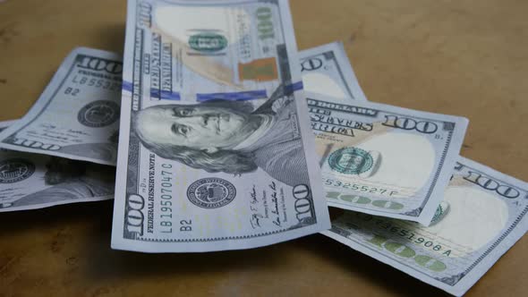 Rotating stock footage shot of $100 bills - MONEY 0144