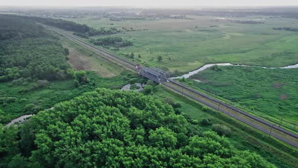 Metal Railway Train Bridge Over the River