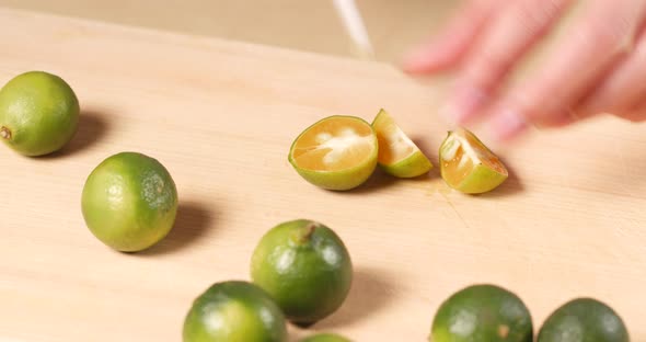 Cutting Citrus on wooden cutting pad