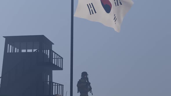 Soldier Guarding the Border Under the Korean Flag