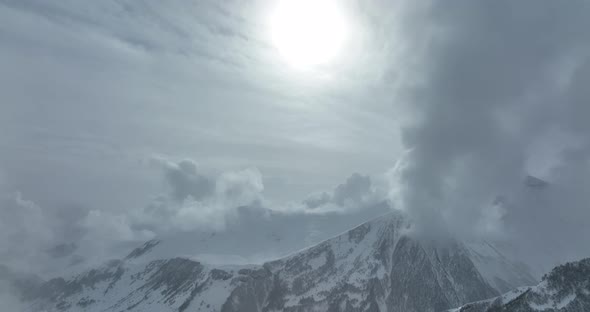 Aerial view of beautiful snowy mountains in Gudauri, Georgia