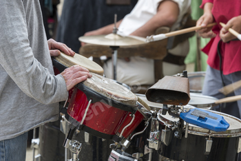 people playing music on the market