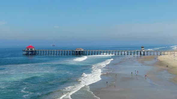 Aerial View of Huntington Pier, Beach and Coastline During Sunny Summer Day