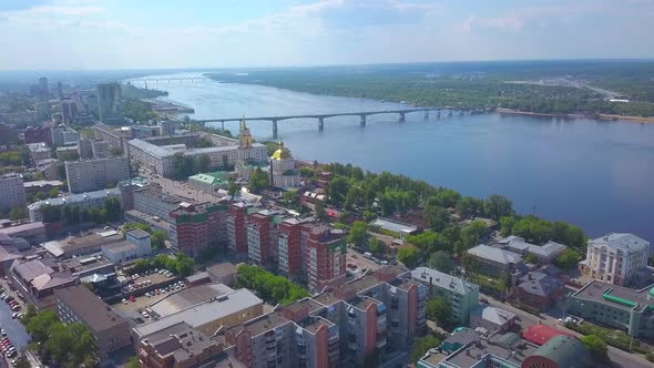 Aerial View of the City Located in Picturesque Area on a Summer Day