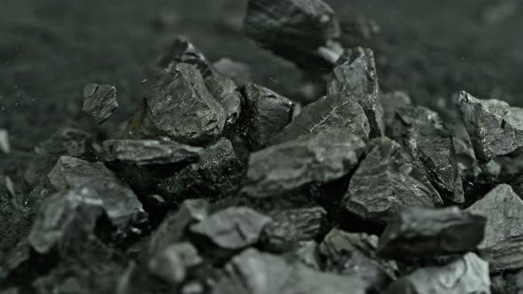 Super Slow Motion Shot of Falling and Crashing Coal at 1000 Fps