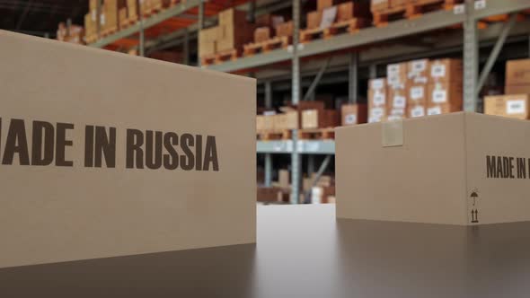 Boxes with MADE IN RUSSIA Text on Conveyor
