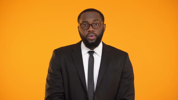 Black Male in Eyeglasses Showing Bunches of Cash, Profit, Lucrative Business