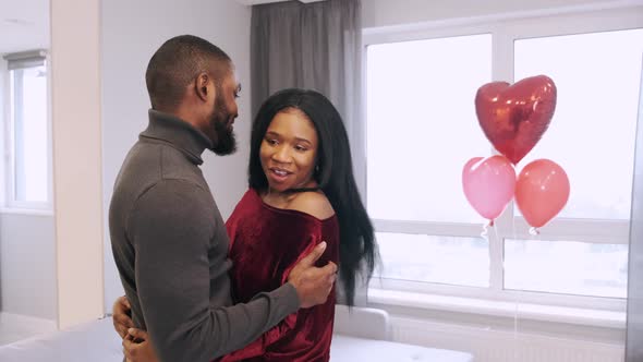 African American Young Couple Celebrating Valentine's Day at Home