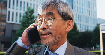 Outdoor, businessman and conversation on phone call in city for contact and communication in Japan.