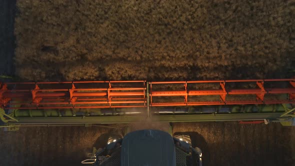 Combine Harvester at Night During the Harvest