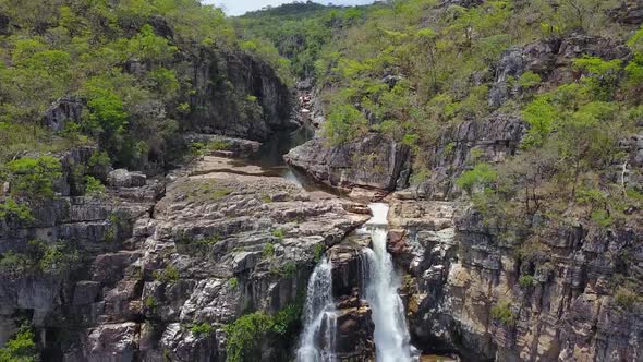 Waterfall tilt down drone clip - Chapada dos Veadeiros, world natural heritage, Brazil
