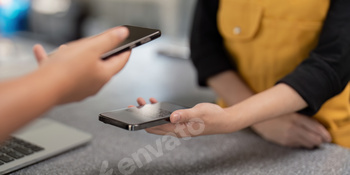 Customers Contactless smartphone payment in a cafe