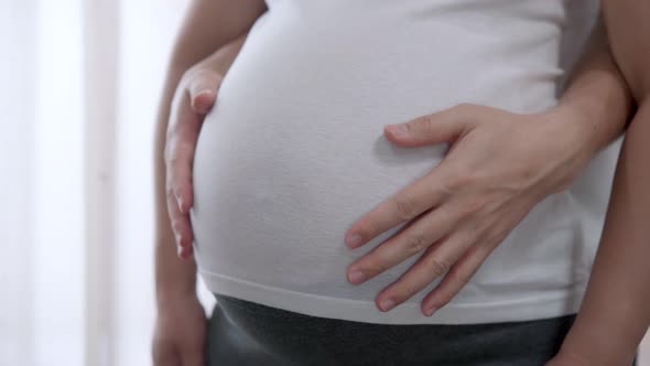 Pregnant Couple Feels Love and Relax at Home