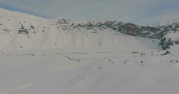 Aerial Flight Over Winter Mountains Snow Ridge