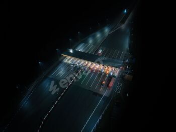 Aerial night view of toll highway payment