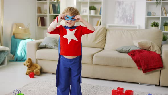 Small Boy Dressing Superhero Eye Mask