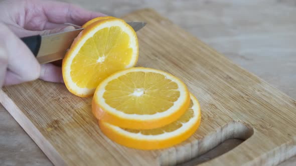 Slicing orange.