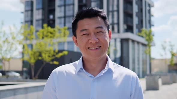 Portrait Young Smiling Confident Smart Asian Businessman Look at Camera