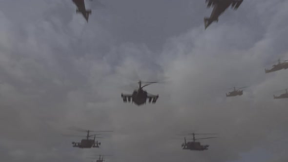 A large number of military helicopters flying in the dirty sky. the concept of war, military conflic
