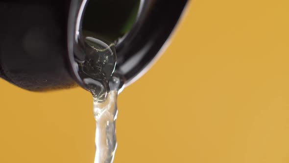 slow motion of macro shot of pouring beer drink, close-up