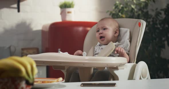 Baby Crying in High Chair