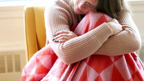 Woman relaxing in living room