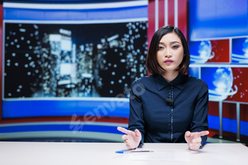 Reporter presenting news on night show