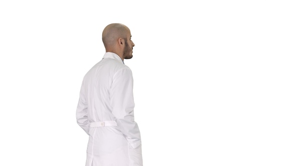 Walking doctor in a robe on white background.