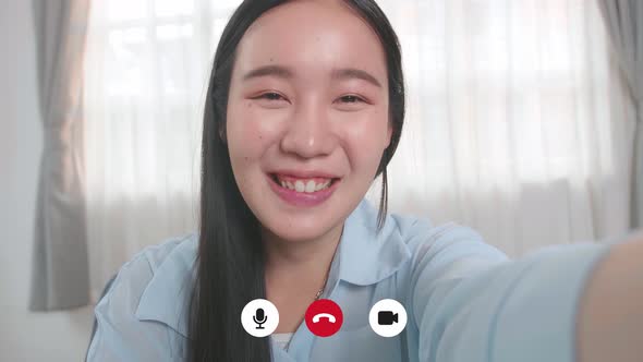 Asian Woman Make A Video Call From Home