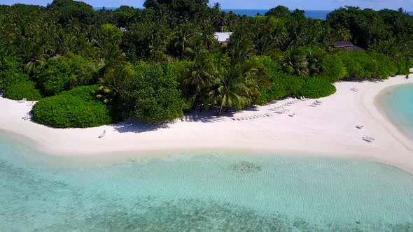 Drone panorama of tourist beach by blue sea and sand background