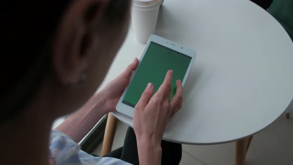 Female Using Digital Tablet