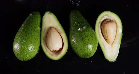 Rain Drops Falling on Fresh Avocado