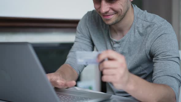 Man Uses Credit Card to Buy Online