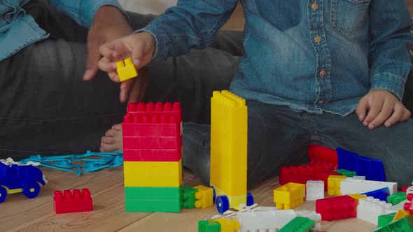 African Family Playing with Construction Blocks