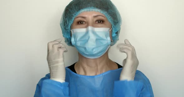 Caucasian female doctor talking to a client using virtual chat about quarantine protective measures.