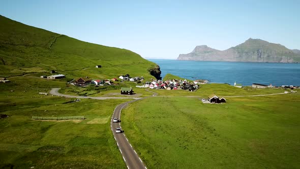 Aerial View of Gjogv Village and Tyril Mountain in Faroe Islands