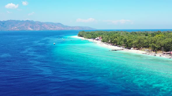 Aerial panorama. tropical island, Gili. Beautiful blue sea water with boats. luxury vacation concept