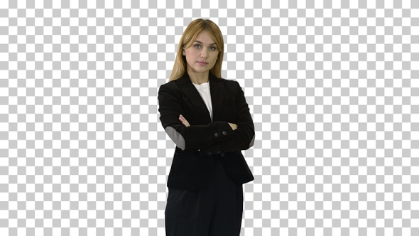 Pretty blonde woman standing with arms crossed, Alpha Channel