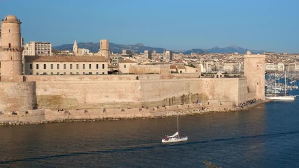 Yachts Coming To Marseille Old Port on Sunset