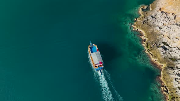 Fishermen fish far out to sea aerial view 4 K