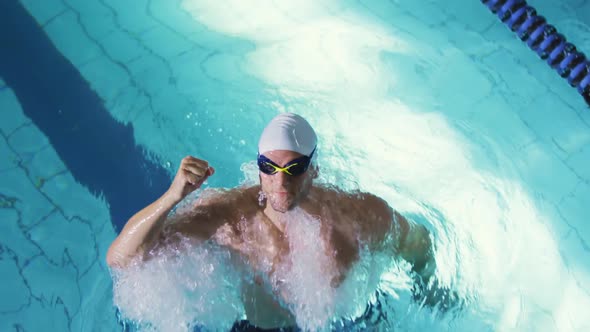 Swimmer training in a swimming pool