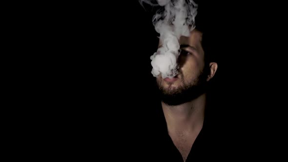Portrait of a smoking man, Vape.
