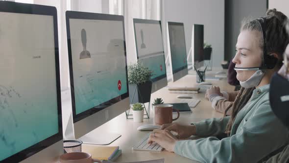 Young People Working in Call Center during Pandemic