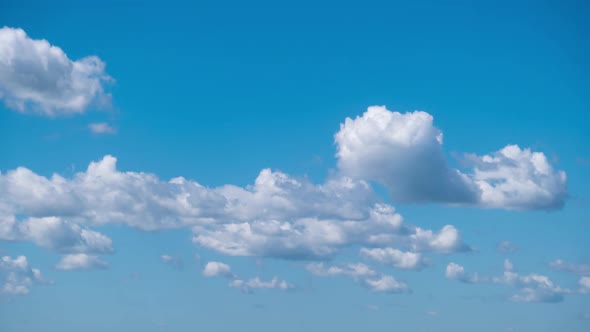 Timelapse of Cumulus Clouds Moving in the Blue Sky