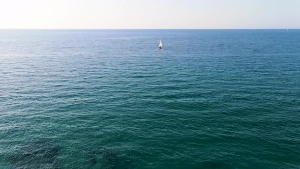 View of transparent and crystal clear water of mediterranean sea with boath floating