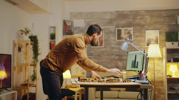 Bearded Architect Working on a Development Project