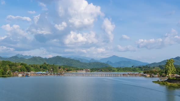 Mon Bridge, longest wooden bridge in Sangkhlaburi, Kanchanaburi, Thailand; zoom in - Time Lapse